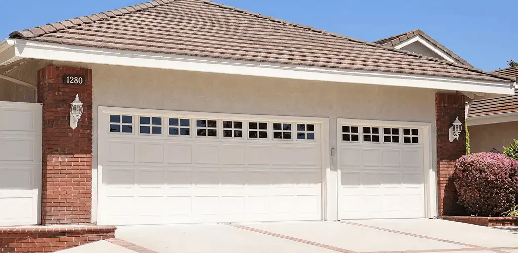 Residential garage door repair service for a double garage door in Boca Raton, FL