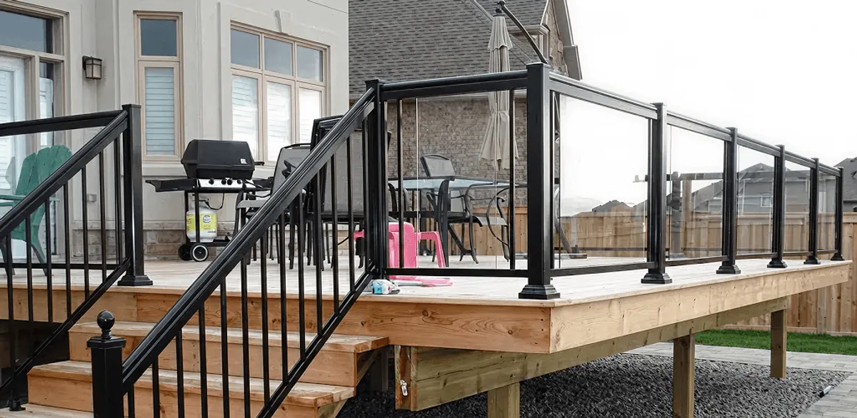 Handrail installation on a deck staircase for safety and code compliance in Boca Raton, FL