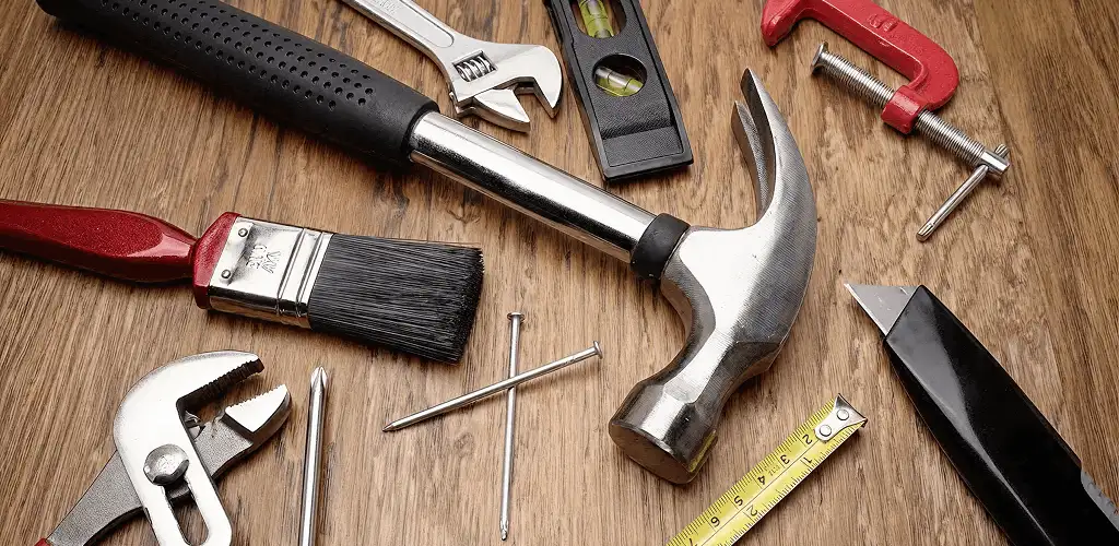 Handyman tools laid out for home repair and maintenance work in Boca Raton, FL